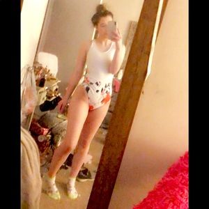 Summery one-piece with a cute floral details